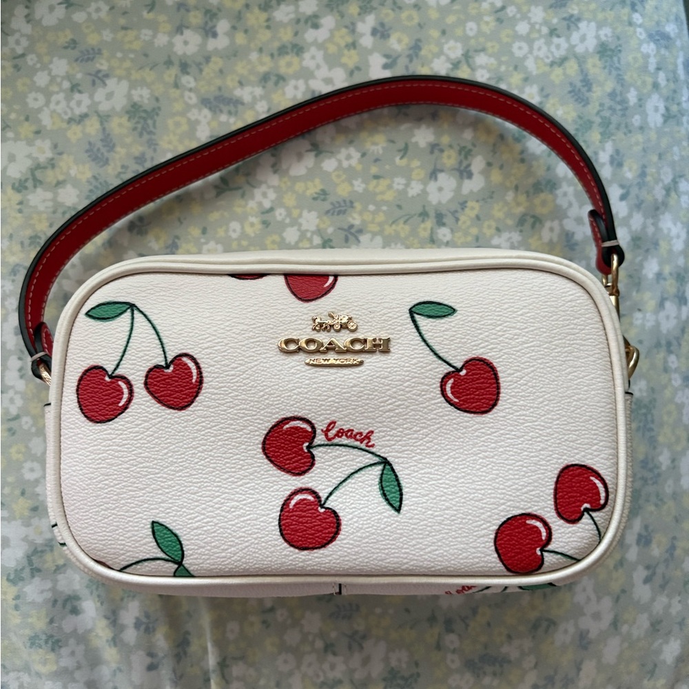 Coach Jamie wristlet with cherry print